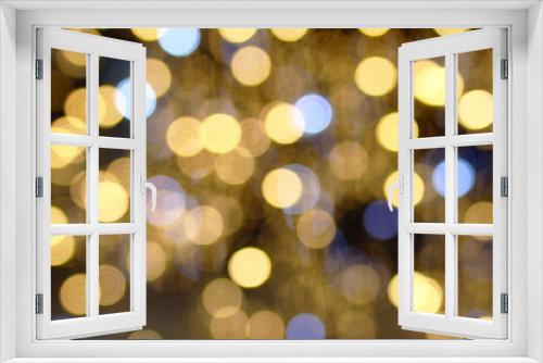 Blurred background in golden colors for New Year and Christmas theme with copy space.