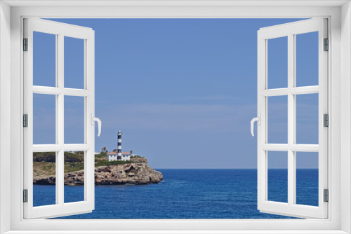 Fototapeta Naklejka Na Ścianę Okno 3D - lighthouse on a land tongue in the ocean