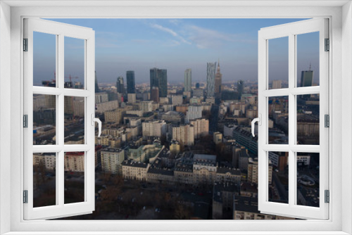 Fototapeta Naklejka Na Ścianę Okno 3D - Aerial view of modern skyscrapers of Warsaw. Poland. 04. December. 2018. Warsaw skyline with urban skyscrapers at sunset.