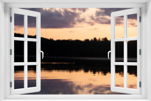 Fototapeta Naklejka Na Ścianę Okno 3D - Sunset on The Lake in Vermont. Beautiful nature retreat. Sunset reflected in the water. Calming and relaxing escape.