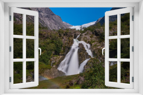 Fototapeta Naklejka Na Ścianę Okno 3D - Kleivafossen Waterfall in the Jostedalsbreen National Park, Sogn og Fjordane, Norway. Long exposure shot. July 2019