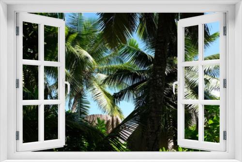 Fototapeta Naklejka Na Ścianę Okno 3D - Palm trees at a Seychelles beach