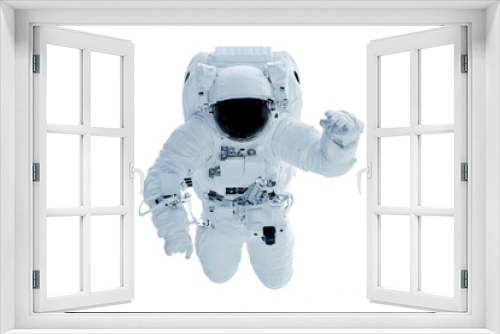 Fototapeta Naklejka Na Ścianę Okno 3D - Astronaut in a darkened spacesuit waving his hand. Isolated on a white background. Elements of this image were furnished by NASA.