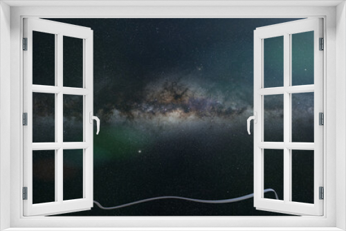 Fototapeta Naklejka Na Ścianę Okno 3D - astronaut in front of the Milky Way galaxy