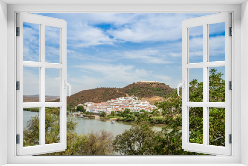 Fototapeta Naklejka Na Ścianę Okno 3D - Sanlucar de Guadiana in Spain pictured from portuguese side on the opposite side of Guadiana river
