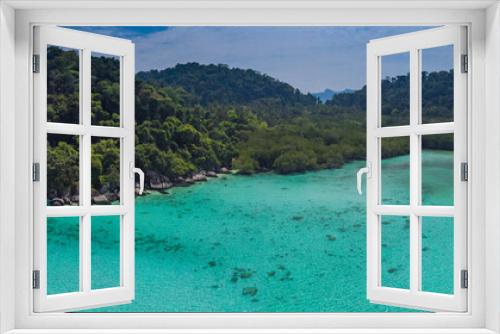 Fototapeta Naklejka Na Ścianę Okno 3D - A diving trip in the crystal clear water in front of a lonely island in Southeast Asia