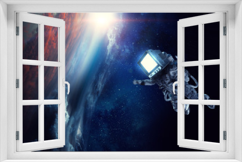 Fototapeta Naklejka Na Ścianę Okno 3D - Monitor headed astronaut. mixed media