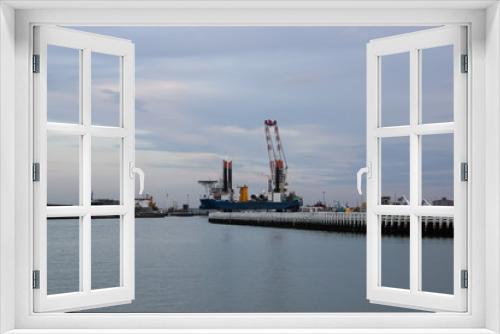 Fototapeta Naklejka Na Ścianę Okno 3D - Lighthouse in Ostende port at North sea