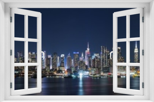 Fototapeta Naklejka Na Ścianę Okno 3D - Panoramic view of the night in Manhattan, cityscapes of New York, USA