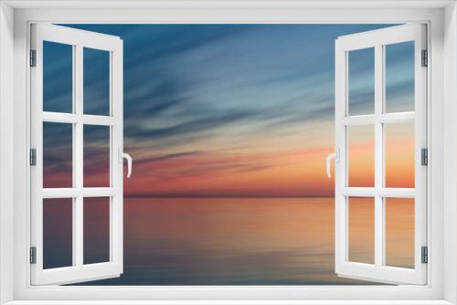Fototapeta Naklejka Na Ścianę Okno 3D - Long-exposure sunrise on the sea