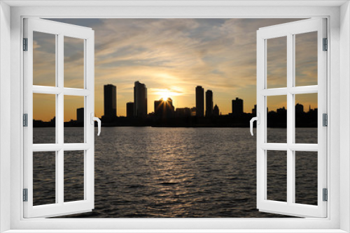 Fototapeta Naklejka Na Ścianę Okno 3D - Sunset from lake Michigan looking at Milwaukee.
