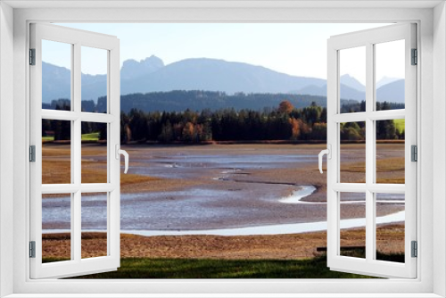 Fototapeta Naklejka Na Ścianę Okno 3D - Blick über ausgelassenen See auf die Berge, Allgäu, Bayern