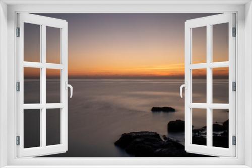 Fototapeta Naklejka Na Ścianę Okno 3D - Pre Sunrise near Cala Bona Mallorca with a flat sea giving a surreal feel to the early morning.