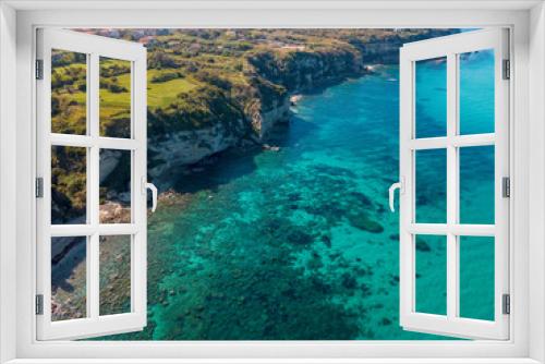 Fototapeta Naklejka Na Ścianę Okno 3D - Aerial view of the Calabrian coast, cliffs overlooking the crystal clear sea and luxury villas. Locality of Riaci south of Tropea. Calabria. Italy