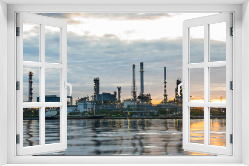 Fototapeta Naklejka Na Ścianę Okno 3D - Oil and gas refinery plant area at sunrise