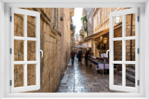 Fototapeta Naklejka Na Ścianę Okno 3D - Dubrovnik, Croatia - July, 2019: Picturesque narrow street in Dubrovnik, Croatia. Dubrovnik joined the UNESCO list of World Heritage Sites