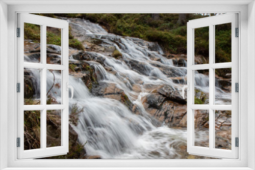 Fototapeta Naklejka Na Ścianę Okno 3D - waterfall in the cairngorms national park, Scotland, during the autumn with orange and yellow leaf birch and pine trees and forest background.