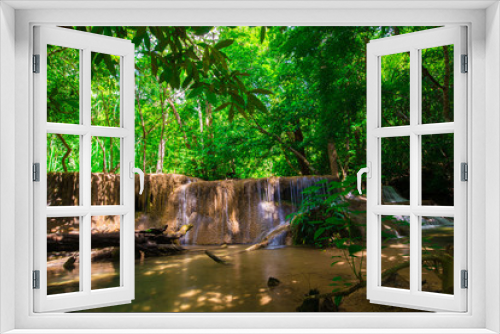 Fototapeta Naklejka Na Ścianę Okno 3D - Waterfall in deep tropical rainforest with green tree