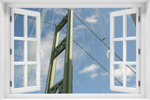 Fototapeta Naklejka Na Ścianę Okno 3D - Detailed image of a cable suspension bridge