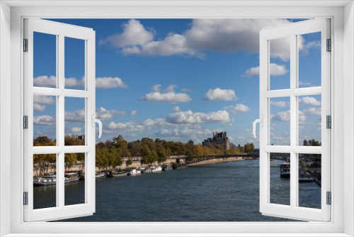 Fototapeta Naklejka Na Ścianę Okno 3D -  View of river channel in Paris France fluffy cloudy blue sky 