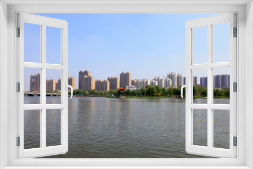 Fototapeta Naklejka Na Ścianę Okno 3D - Riverside Building in china