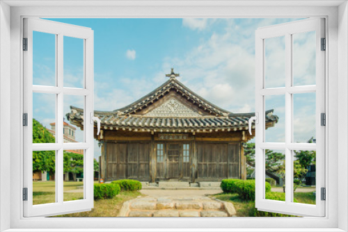 Fototapeta Naklejka Na Ścianę Okno 3D - A Cathedral built in Korean traditional architecture style on a fine day.