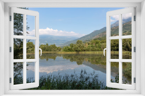 Fototapeta Naklejka Na Ścianę Okno 3D - a lake in Les Iles nature reserve on the Dora Baltea river, Brissogne, Aosta Valley, Italy