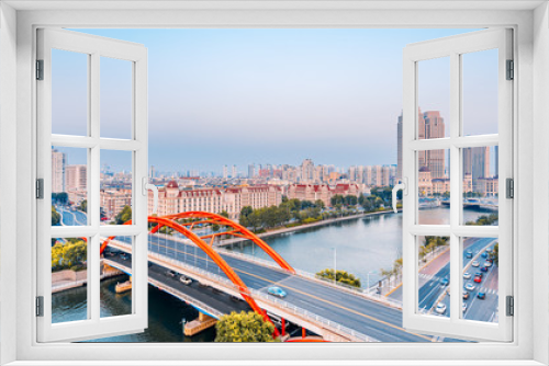 Fototapeta Naklejka Na Ścianę Okno 3D - Dusk scenery of Haihe River and Jingang Bridge in Tianjin, China