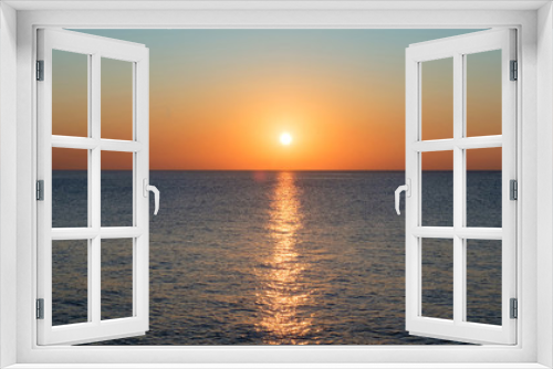 Fototapeta Naklejka Na Ścianę Okno 3D - View of the calm sea and sunset sky