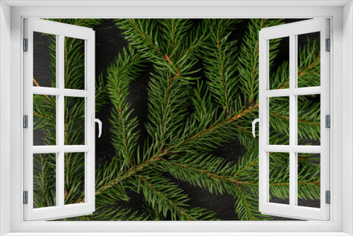 Fototapeta Naklejka Na Ścianę Okno 3D - One whole christmas green branch spruce flatlay on grey stone