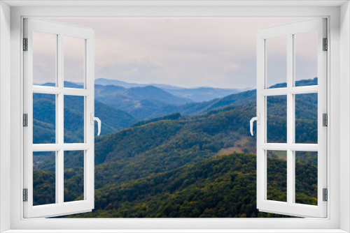 Fototapeta Naklejka Na Ścianę Okno 3D - Aerial view mountain with trees in autumn