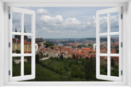 Fototapeta Naklejka Na Ścianę Okno 3D - Prague, la cathédrale Saint-Guy domine la ville