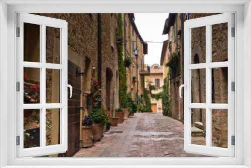 Fototapeta Naklejka Na Ścianę Okno 3D - Narrow streets with romantic medieval architecture at city of Pienza, Siena province, Tuscany, Italy