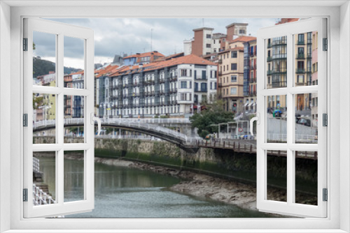 Fototapeta Naklejka Na Ścianę Okno 3D - City landscape with a Nevion River, Bridge and promenade, Bilbao, Spain.