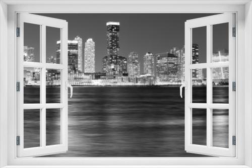 Fototapeta Naklejka Na Ścianę Okno 3D - Black and white picture of Jersey City skyline at night.