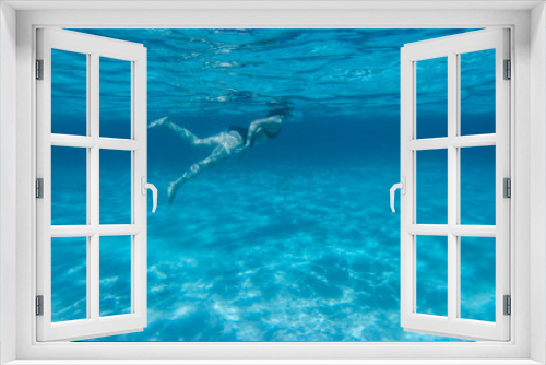 Fototapeta Naklejka Na Ścianę Okno 3D - Diving in the red sea. Sexy girl in bikini and mask. Snorkeling. Traveling lifestyle. Water sports. Beach holidays.