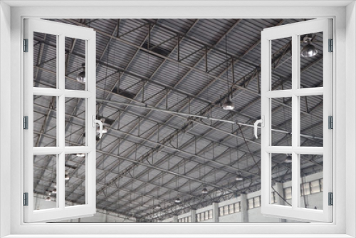 Fototapeta Naklejka Na Ścianę Okno 3D - Metal aluminium frame roof and lighting construction design at warehouse factory industry 