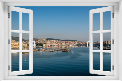 Fototapeta Naklejka Na Ścianę Okno 3D - Mytilene port early in the morning as seen from the boat, in the island of Lesvos, Greece