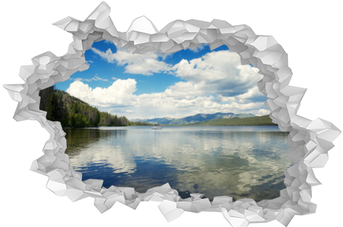 Panoramic view of puffy white clouds reflecting on the surface of a tranquil Alturas Lake in the Rocky Mountains of Idaho, USA