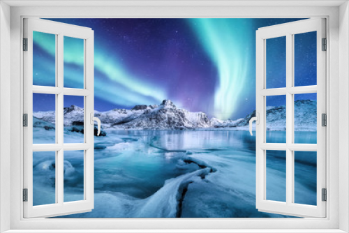 Fototapeta Naklejka Na Ścianę Okno 3D - Aurora Borealis, Lofoten islands, Norway. Nothen light, mountains and frozen ocean. Winter landscape at the night time. Norway travel - image