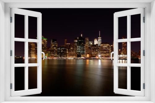 Fototapeta Naklejka Na Ścianę Okno 3D - New York City Skyline Manhattan Buildings at night