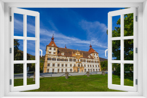 Fototapeta Naklejka Na Ścianę Okno 3D - Colorful autumn colors, bright blue sky in the park and Eggenberg Palace in Graz, Styria region, Austria