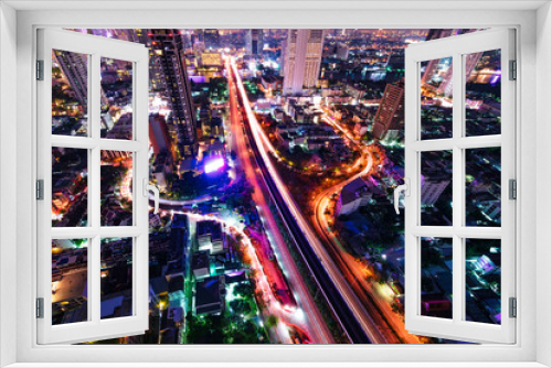 Fototapeta Naklejka Na Ścianę Okno 3D - Night View of Cityscape of downtoen in Bangkok , Thailand . Beautiful of steet light from long explosure technicque present amazine night view in City