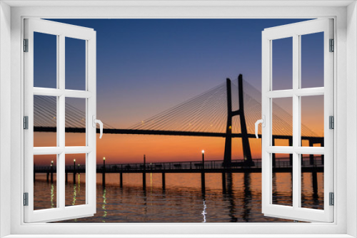 Fototapeta Naklejka Na Ścianę Okno 3D - Vasco da Gama Bridge Silhouette at Dawn