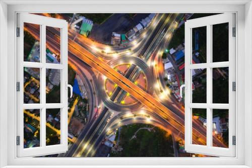 Fototapeta Naklejka Na Ścianę Okno 3D - Aerial view of highway junctions Top view of Urban city, Bangkok at night, Thailand. Light trails across road junction, traffic abstract and transportation concept.
