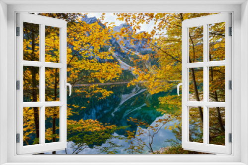 Fototapeta Naklejka Na Ścianę Okno 3D - Peaceful autumn Alps mountain lake with clear transparent water and reflections. Gosauseen or Vorderer Gosausee lake, Upper Austria. Dachstein summit and glacier in far.