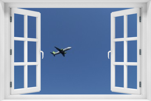 Fototapeta Naklejka Na Ścianę Okno 3D - Airplane in the blue sky