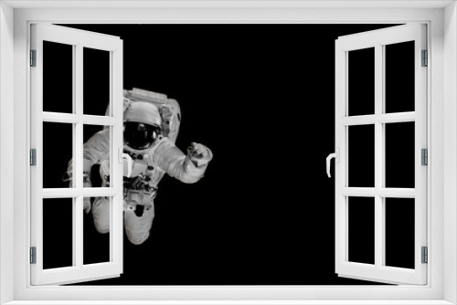 Fototapeta Naklejka Na Ścianę Okno 3D - astronaut flies over the earth in space.