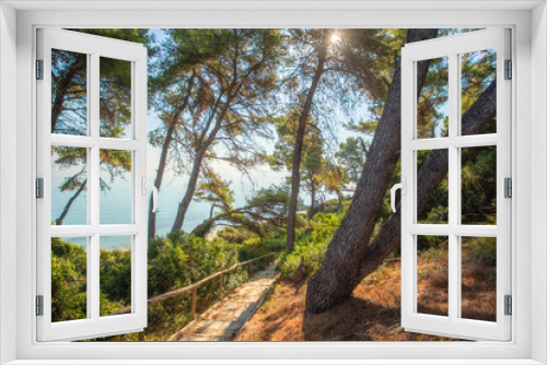 Fototapeta Naklejka Na Ścianę Okno 3D - Beautiful amazing sunny landscape and wooden steps down to perfect beach. Way to tourists paradise concept. Horizontal color photography.