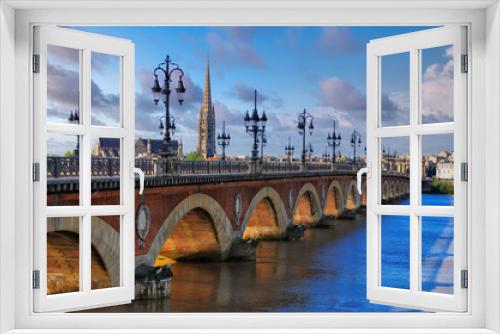 Fototapeta Naklejka Na Ścianę Okno 3D - Scenic view of Bordeaux river bridge with St Michel cathedral, France